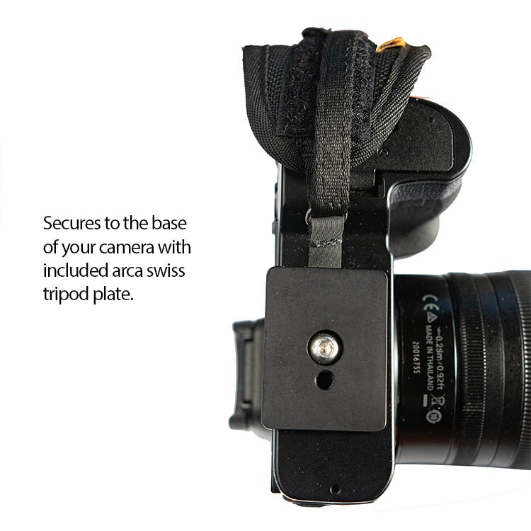 Cotton Carrier hand grip camera strap secures to the base of your camera with included arca swiss tripod plate